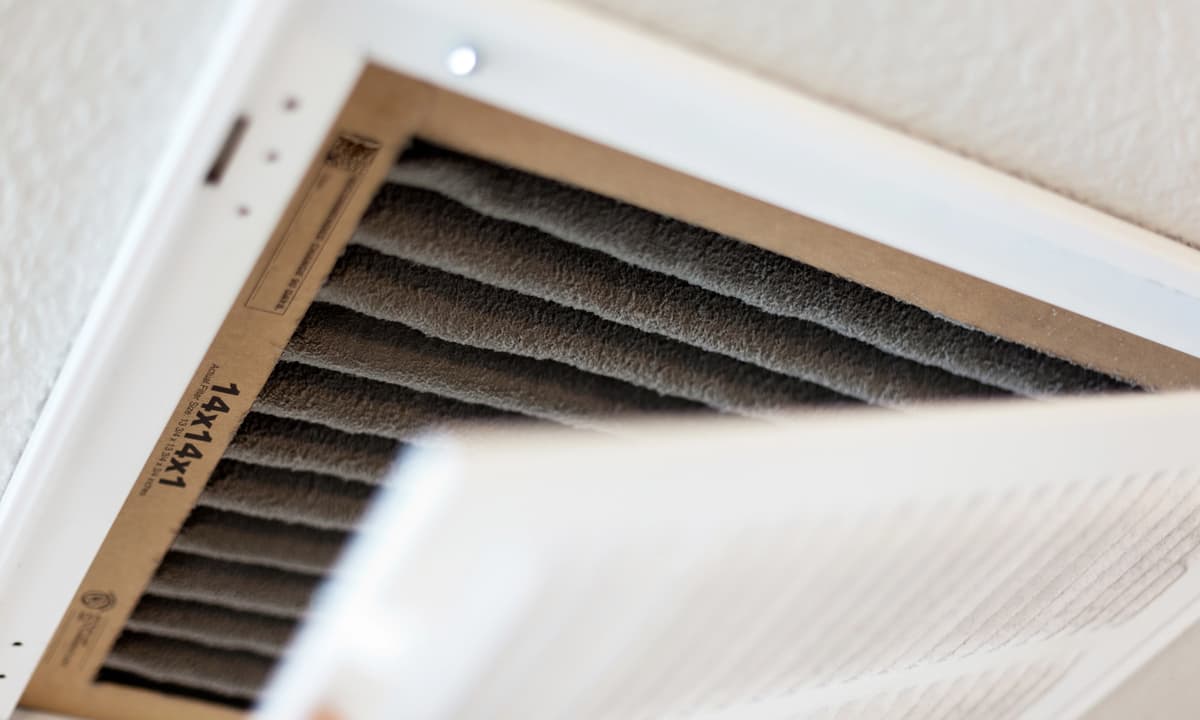 Close up of a dirty AC filter.
