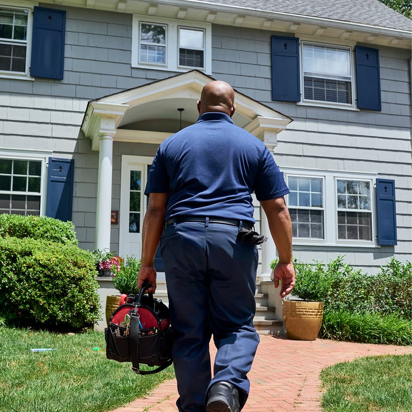 A Sansone technician arrives at a home ready to provide expert HVAC, plumbing, and electrical services.